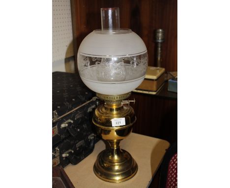 A BRASS OIL LAMP