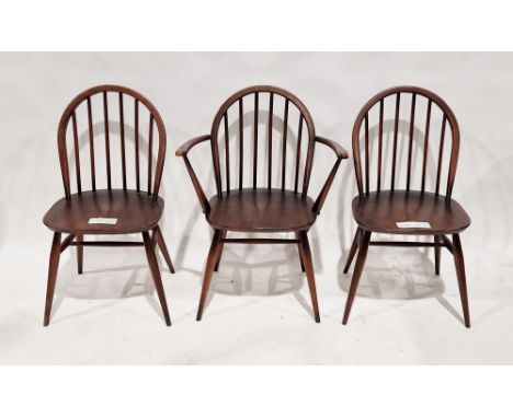 Set of three stained Ercol Windsor-style dining chairs, one being a carver, 82cm high (3)&nbsp;