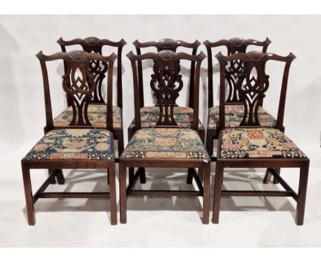 Set of six Chippendale period mahogany dining chairs, with shaped and carved top rails and pierced and carved upright splats,