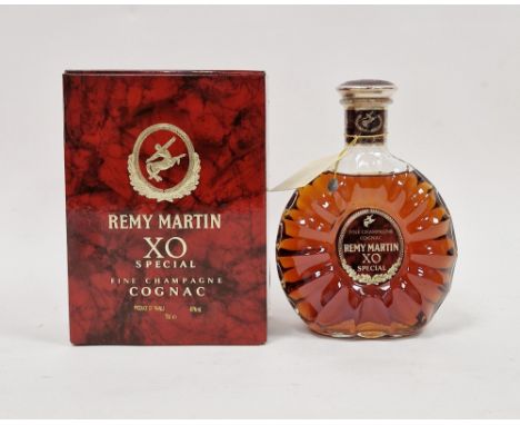 Bottle of Remy Martin fine champange cognac XO special&nbsp;in original red box&nbsp;