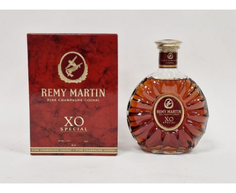 Bottle of Remy Martin fine champange cognac XO special&nbsp;in original red box&nbsp;