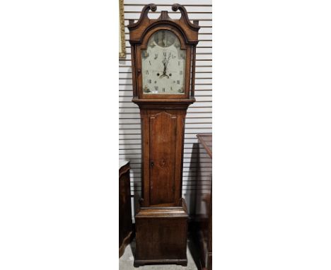 Late 18th century eight-day longcase clock&nbsp;in stained oak case with inlaid shell motif to the door, painted broken arch 