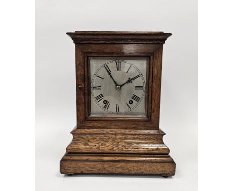Oak cased four-glass mantel clock&nbsp;of rectangular form, on stepped moulded base, a 15cm square dial with roman numerals, 