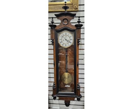 19th century Vienna-style walnut regulator clock, with a white enamel dial, with black Arabic numerals to chapter ring and se