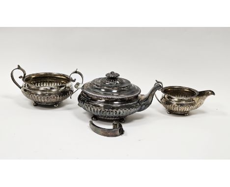 George IV silver tea service, probably Simon Levy, Exeter 1825, comprising teapot, sugar bowl and milk jug, each of circular 