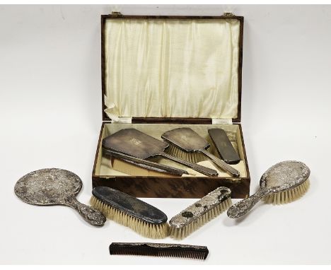 Four-piece silver-backed dressing table set by W I Broadway &amp; Co, Birmingham 1947, comprising comb, mirror and two brushe