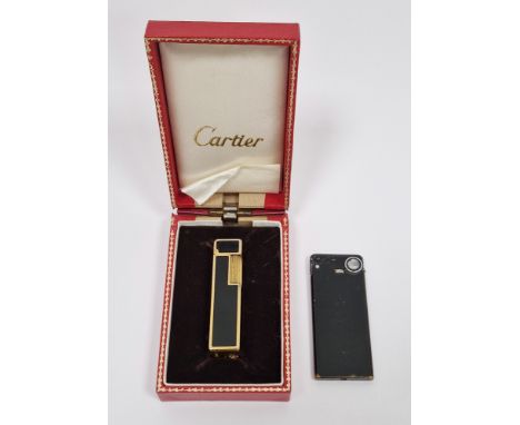 Cartier gold-plated and black enamel lighter of square section, boxed, and a Prince Racing 45 slim-line lighter