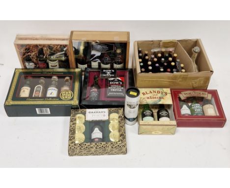 Seven miniature gift box sets to include four brandy bottle set, Irish whiskeys, ports, etc and a mini-tube of Islay single m