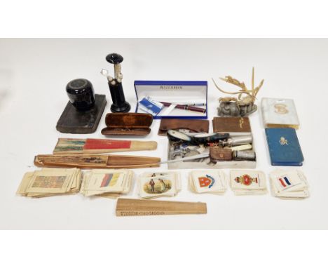 Boxed Waterman fountain pen, a Russian painted lacquered brooch, various commemorative coins, a collection of Kensitas Cigare