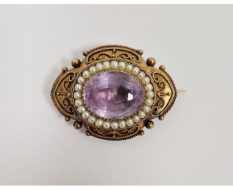 Victorian gold-coloured metal, pink stone and pearl brooch, the oval pink cut stone with pearl border, filigree and ball oute