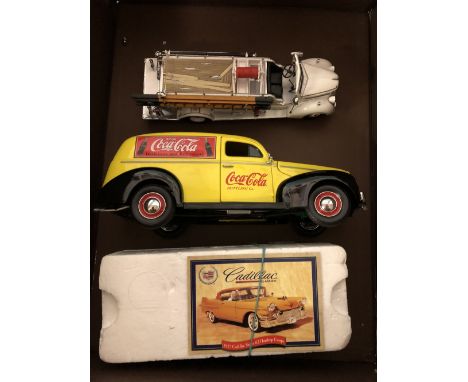Franklin Mint fire engine a Matchbox Coca-Cola van and a Cadillac model car