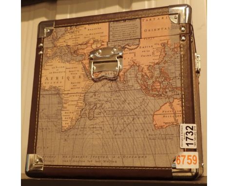 Wooden trunk decorated with a map of the world