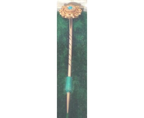 Boxed 15ct gold stick pin set with turquoise stone