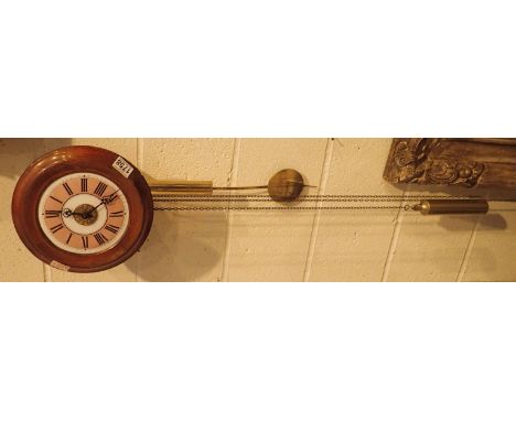 Twin weight enamel faced wall clock 