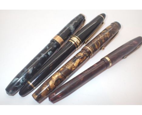 Four fountain pens Mentmore Conway Stewart and one other ( some gold nibbed )
