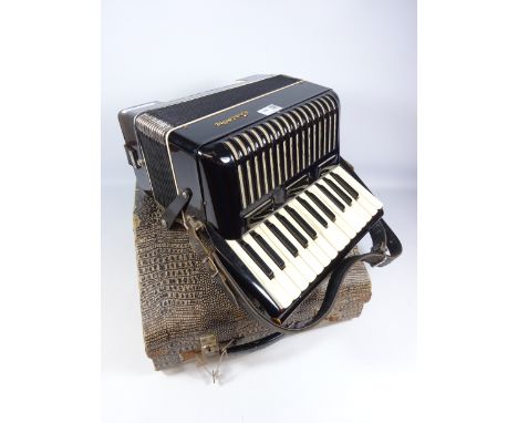 Galotta piano accordion, in case    Condition Report   Click here for further images, condition, auction times & delivery cos