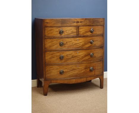 Early 19th century mahogany bow front chest of two short & three long drawers, brass handles and bracket feet W100cm, D52cm, 