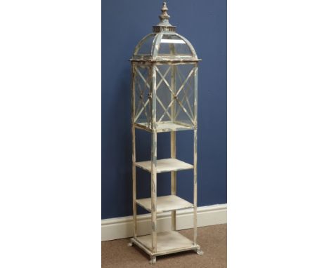 Metal dome top lantern on three tier stand, H128cm