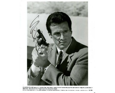 STALLONE SYLVESTER: (1946- ) American Actor, an Academy Award nominee. A good signed 8 x 10 photograph of Stallone in a head 