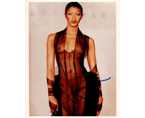 CAMPBELL NAOMI: (1970- ) British Model. A very fine signed colour 8 x 10 photograph of Campbell, the attractive image showing