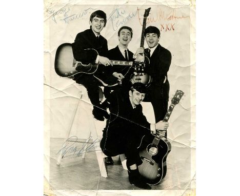 BEATLES THE: A good vintage signed 6.5 x 8.5 photograph by all four members of the English rock band the Beatles individually