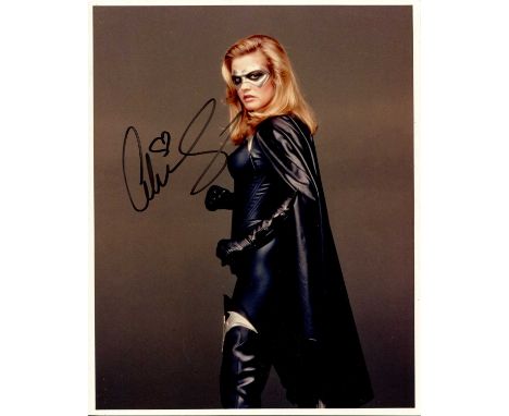SILVERSTONE ALICIA: (1976- ) American actress. Signed colour 8 x 10 photograph of Silverstone standing in a three-quarter len