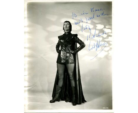 LAFFAN PATRICIA: (1919-2014) English actress. A rare vintage signed and inscribed 8 x 10 photograph of Laffan standing in a f