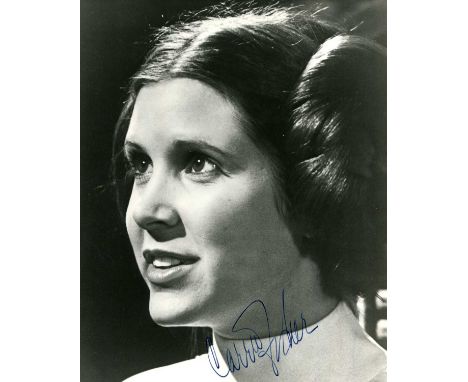 FISHER CARRIE: (1956-2016) American actress. An excellent signed 8 x 10 photograph of Fisher in a close-up head and shoulders