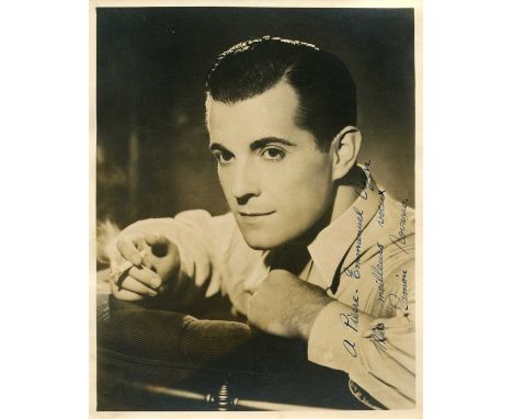 NOVARRO RAMON: (1899-1968) Mexican actor. A good vintage signed and inscribed sepia 8 x 10 photograph of Novarro in a head an
