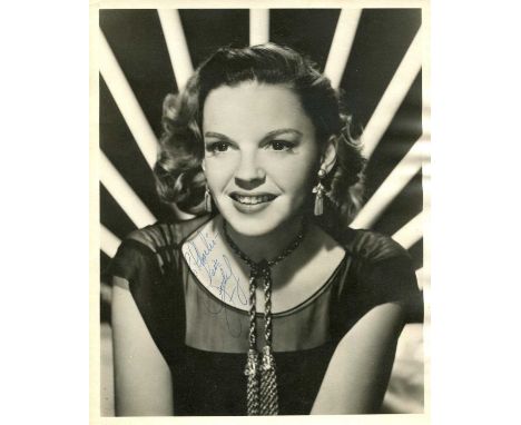 GARLAND JUDY: (1922-1969) American actress and singer, Academy Award winner. An excellent vintage signed and inscribed 8 x 10
