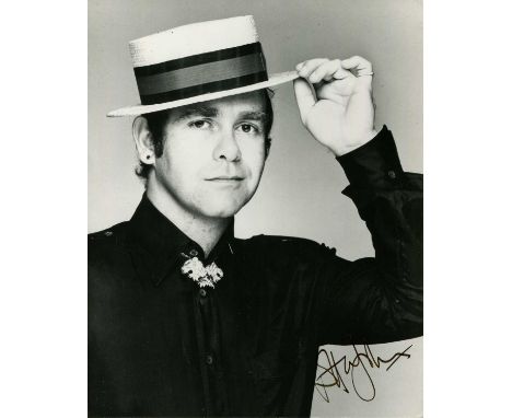 JOHN ELTON: (1947- ) British singer and pianist, Academy Award winner. Signed 8 x 10 photograph of the musician in a head and