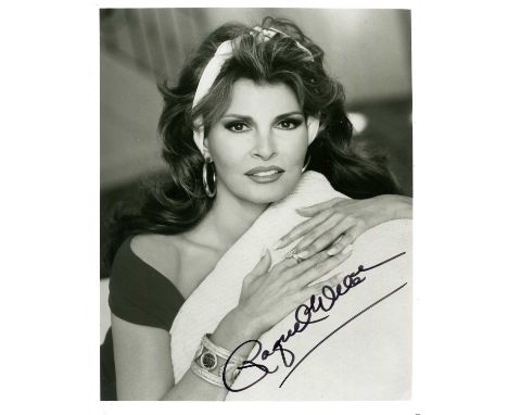 WELCH RAQUEL: (1940-2023) American actress and model. Signed 8 x 10 photograph of Welch, the image depicting her in a head an