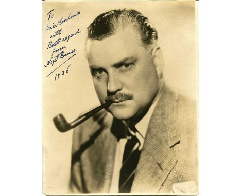 BRUCE NIGEL: (1895-1953) British character actor, remembered for his portrayal of Dr. Watson opposite Basil Rathbone in a ser