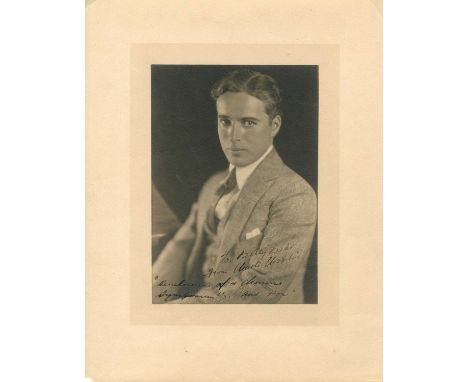 CHAPLIN CHARLES: (1889-1977) English film comedian, Academy Award winner. A fine vintage signed and inscribed sepia 11 x 14 p