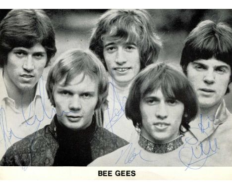 BEE GEES THE: A rare fully signed vintage 6 x 4.5 promotional photograph by all three members of the musical group and their 