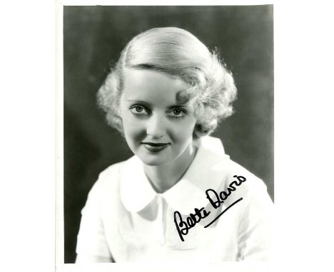 DAVIS BETTE: (1908-1989) American actress, Academy Award winner. Signed 8 x 10 photograph of the young Davis in a head and sh