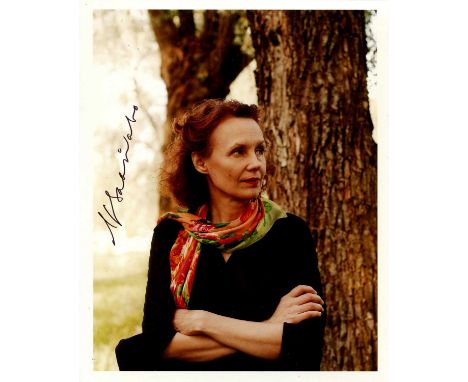 SAARIAHO KAIJA: (1952-2023) Finnish composer. Signed colour 8 x 10 photograph of Saariaho standing outdoors in a half-length 