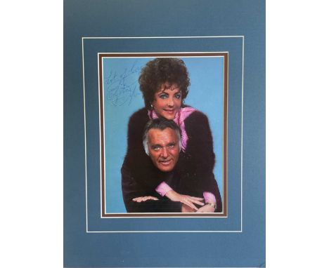 TAYLOR ELIZABETH: (1932-2011) British actress, Academy Award winner. Signed colour 8 x 10.5 printed image, evidently removed 