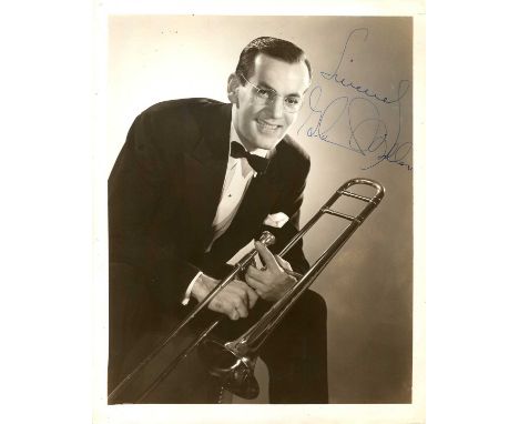 MILLER GLENN: (1904-1944) American big band trombonist and bandleader. Vintage signed 8 x 10 photograph of Miller in a three-
