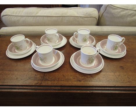 A set of six Susie Cooper coffee cups, saucers and side plates, a/f 
