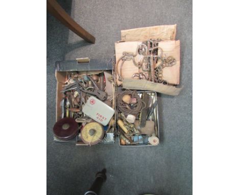 A box and tray of tools, door knockers, tape measures etc. 