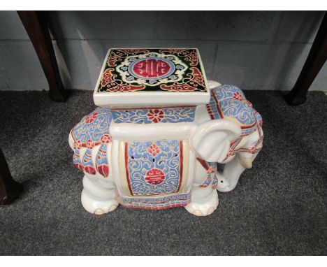 A ceramic decorative elephant jardiniere stand/seat, 41cm high 