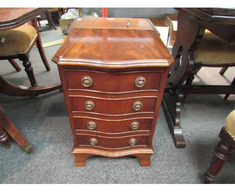 A modern slim mahogany low chest of four drawers with ring drop handles, 61cm x 40cm x 33cm 