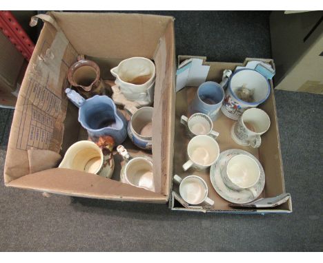 Two boxes containing commemorative jugs, harvest cups/mugs, etc. some a/f 