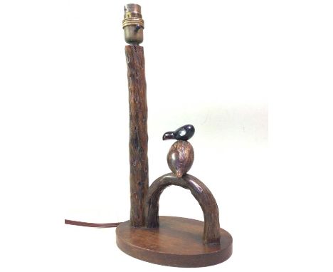 HENRY HOWELL FOR ALFRED DUNHILL, YZ BIRD TABLE LAMP, CIRCA 1920-40 modelled with cherry red bakelite and nut toucan over an o