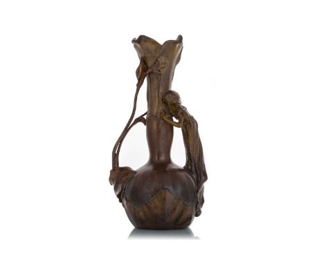 ART NOUVEAU BRONZED SPELTER VASE, EARLY 20TH CENTURY the handle modelled as a female, with stylised foliate decoration, signe