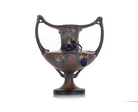 AMPHORA, AUSTRIAN ART NOUVEAU VASE, LATE 19TH / EARLY 20TH CENTURY of twin-handled urn form, with grape decoration in high re