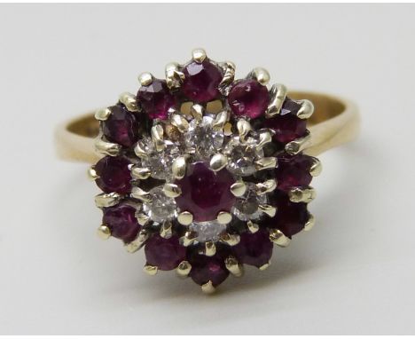 A 9ct gold, ruby and diamond cluster ring, 2.8g, M