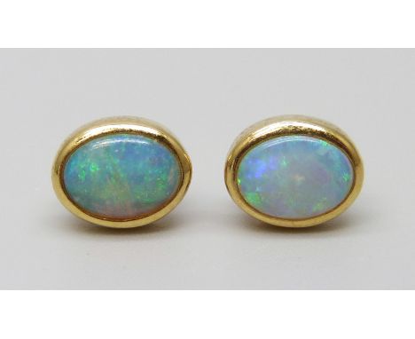 A pair of 18ct gold opal stud earrings, boxed, 2.4g