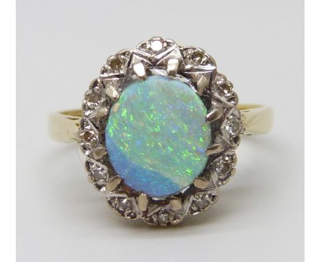 An 18ct gold, opal and diamond ring, 5.1g, N